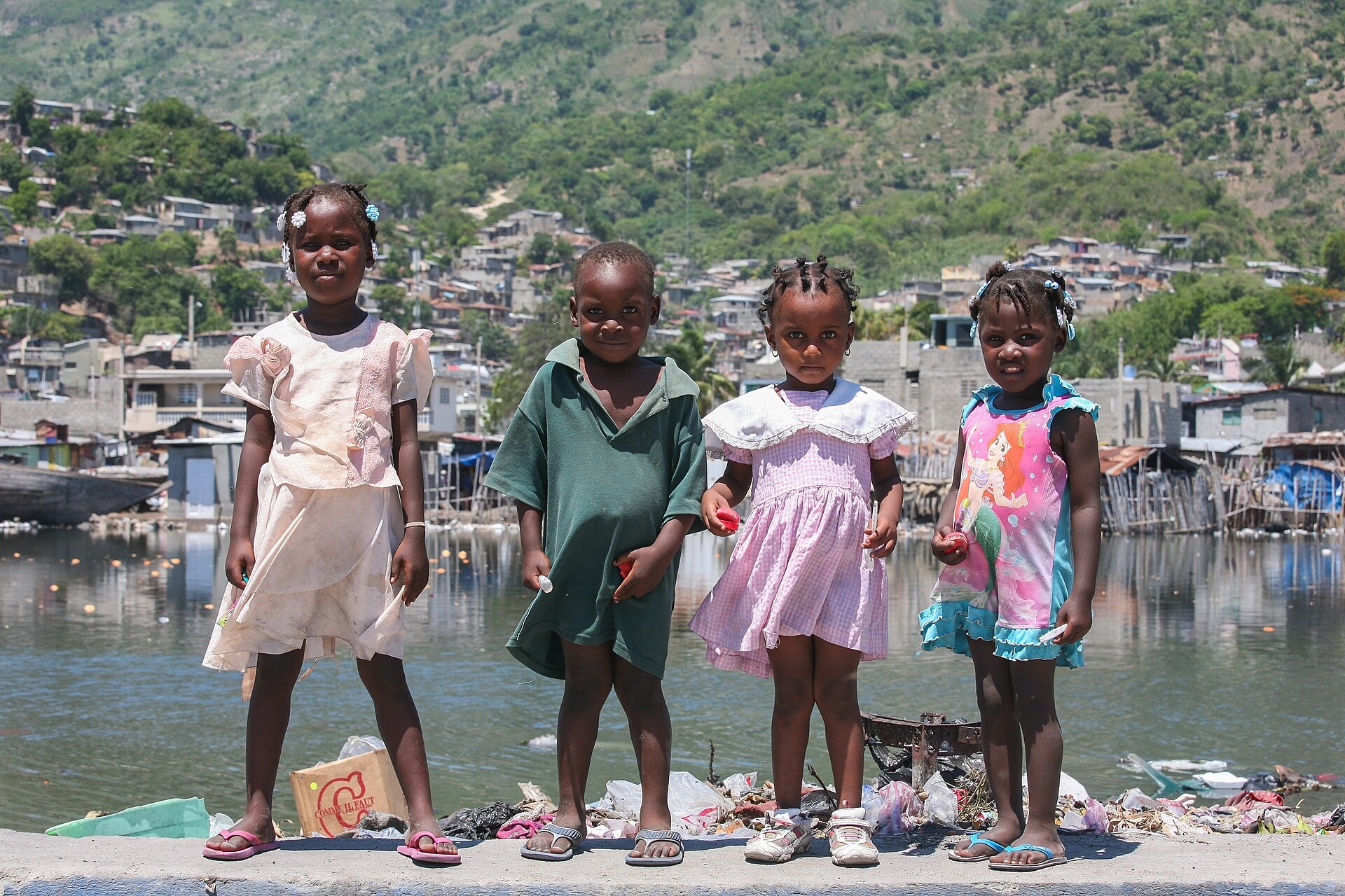 Children by the river in Cap-Haïtien