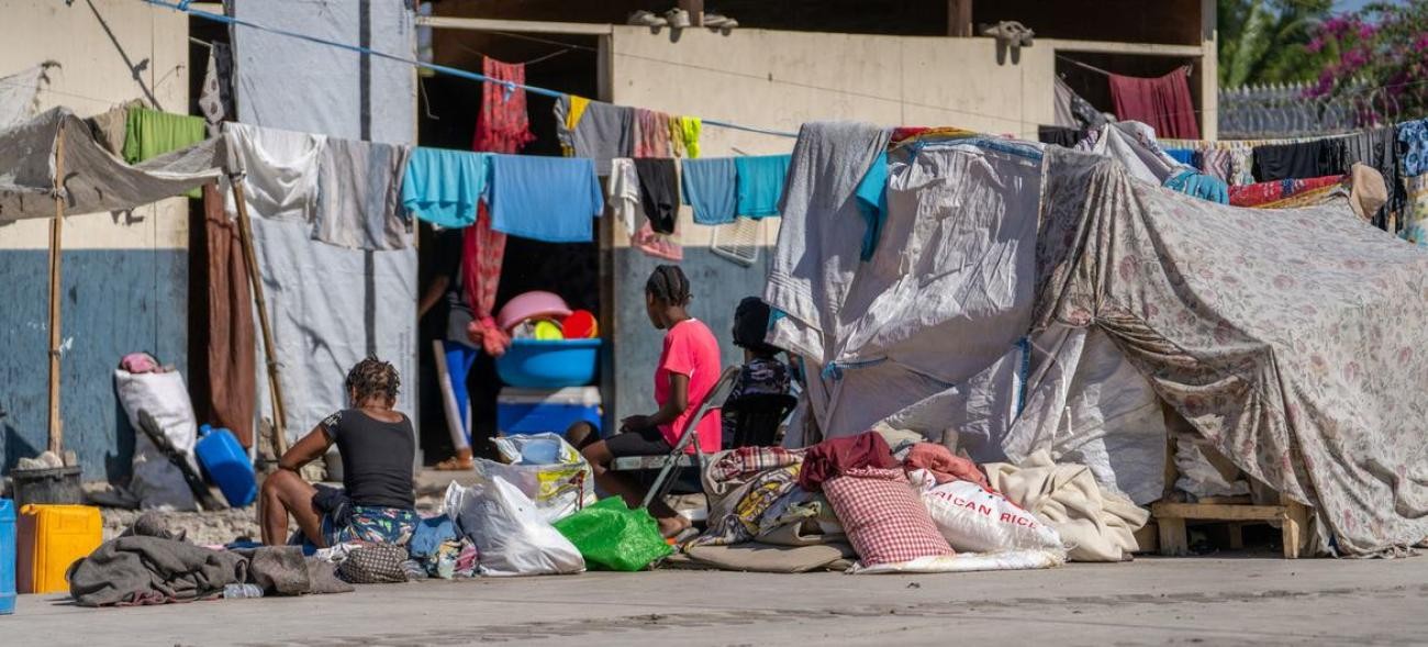 Families shelter in a school in central Port-au-Prince